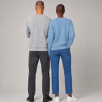 Mia and Noah wearing the unisex PlanetAir sweatshirt in aquamarine and heather grey, back view