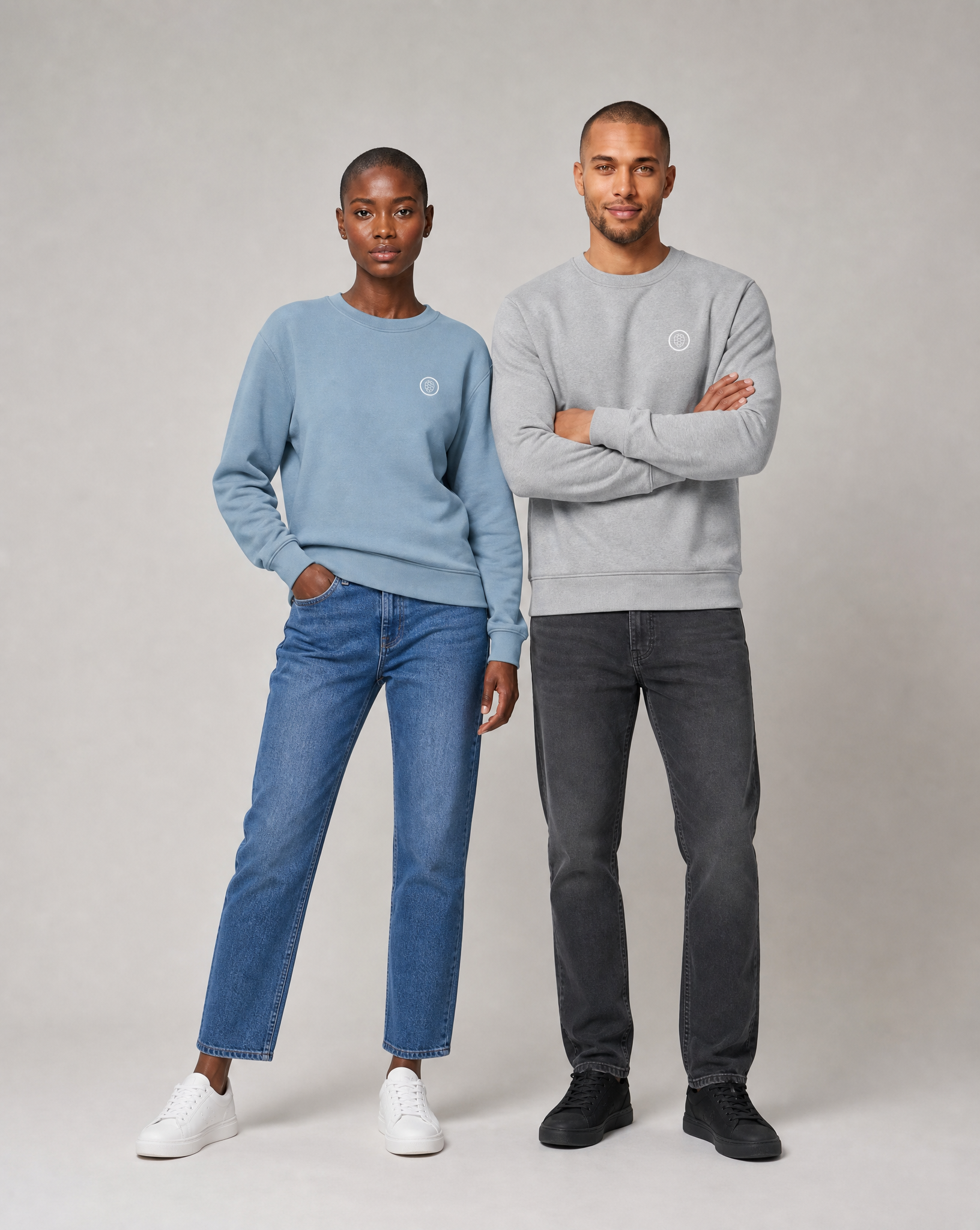 Mia and Noah wearing the unisex PlanetAir sweatshirt in aquamarine and heather grey, front view