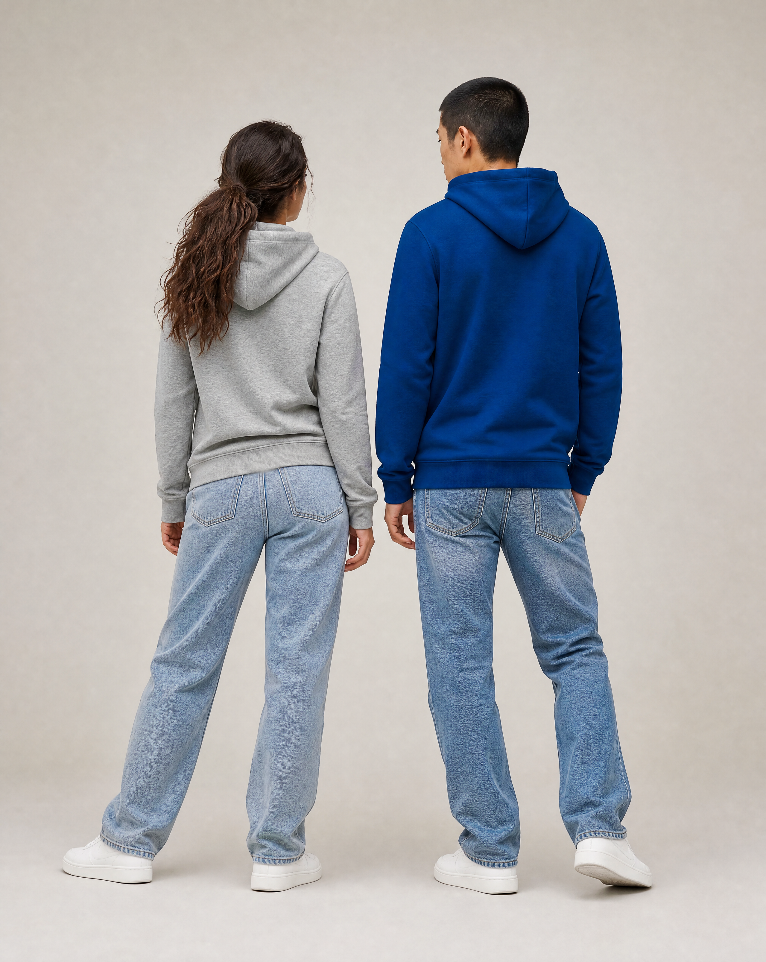Jun and Vera wearing the unisex WindWhisper zip hoodie - back view